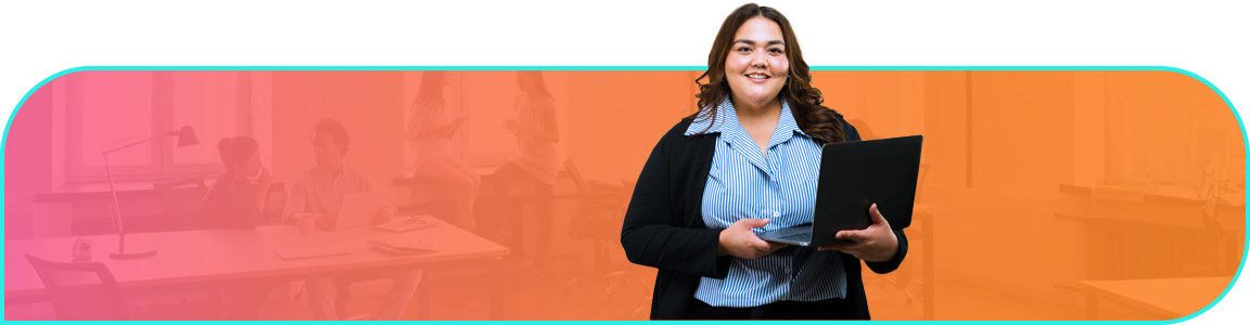 Businessperson holds a laptop and smiles