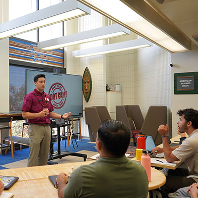 ASB teammate presenting to students