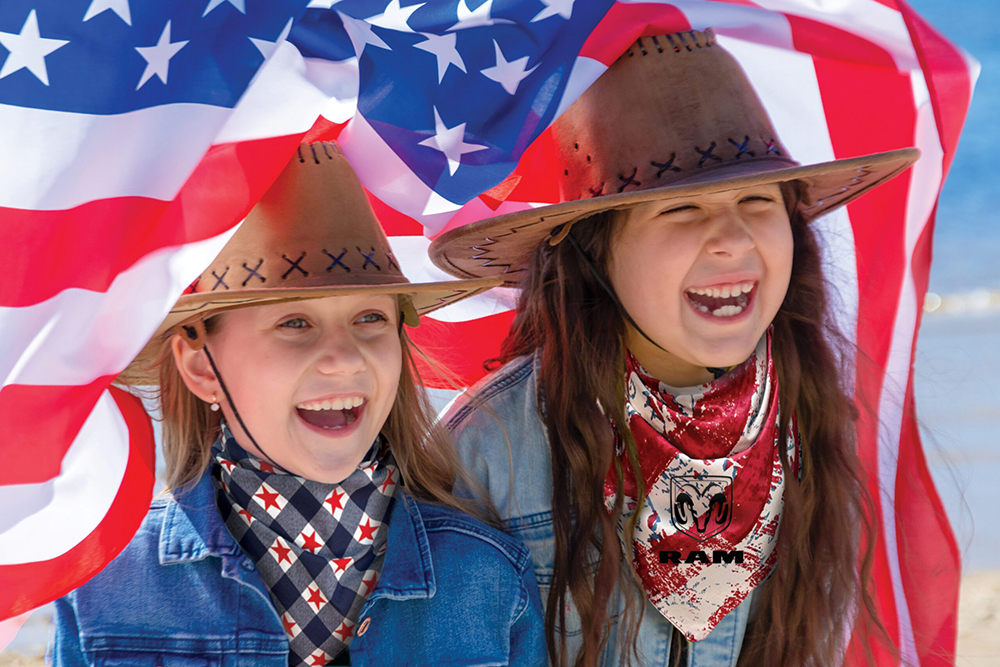 Patriotic girls wearing promotional bandannas