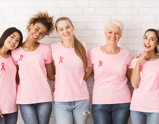 Group of women wearing pink t-shirts