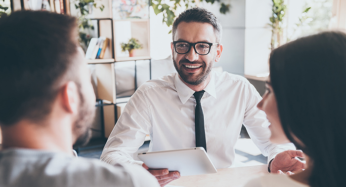 Financial advisor helping a couple