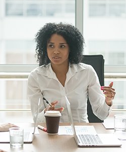 Female Executive leading a meeting