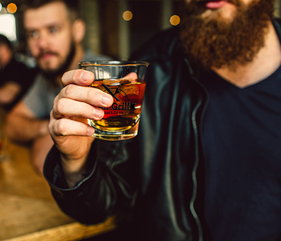 Man holding cocktail glass