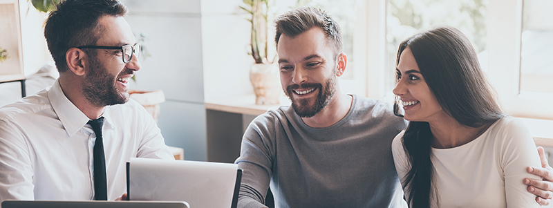 Couple working with a real estate agent