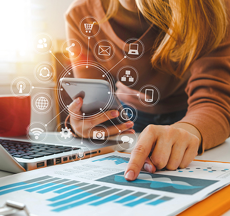 On a phone with marketing icons around, pointing at a sales sheet