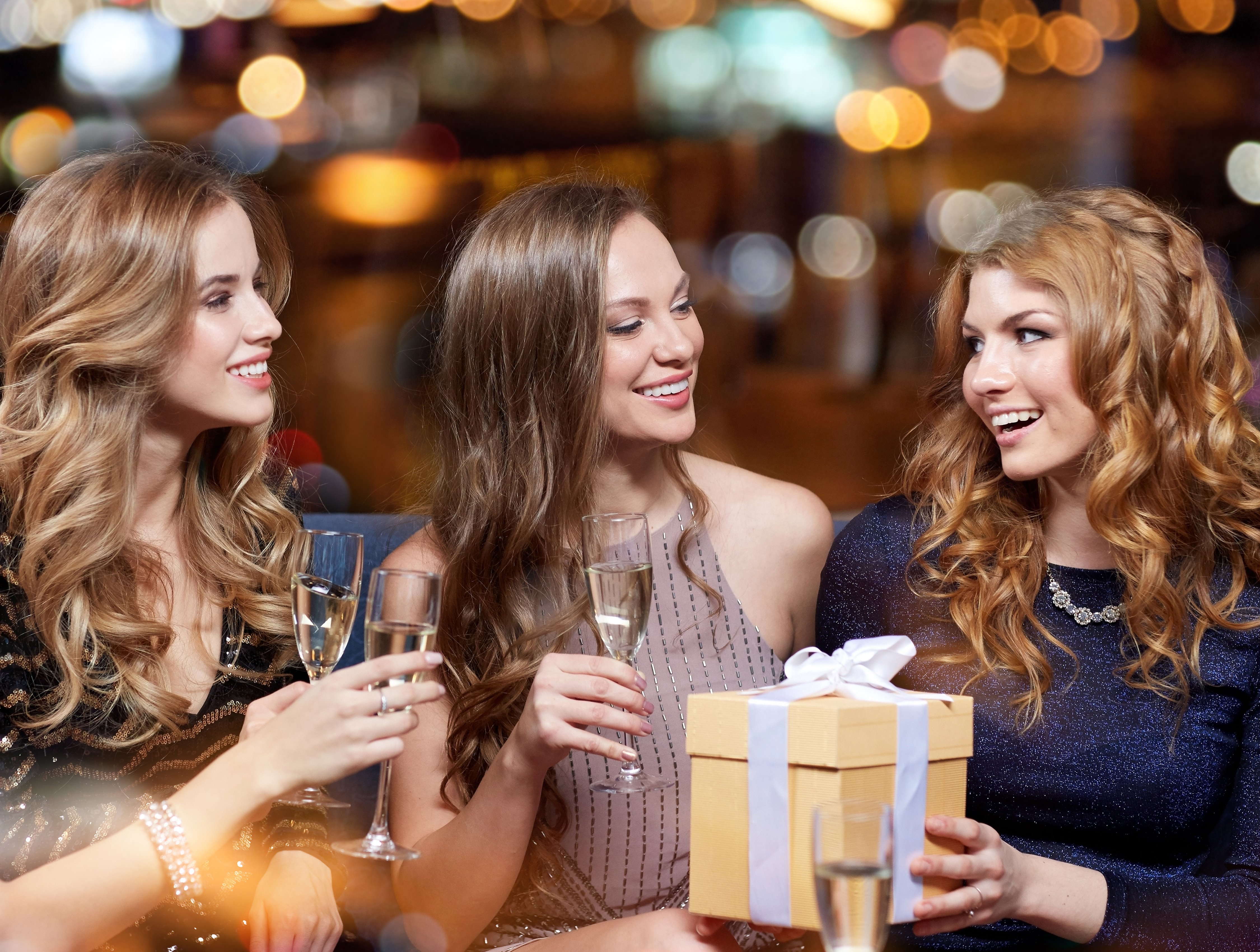 Young woman holding glass a beer mug