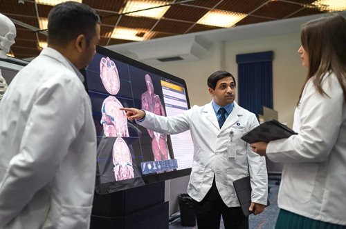 Professor giving lecture in auditorium